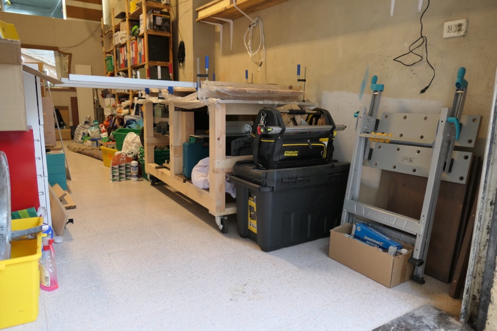 Workbench and tools packed away in the garage